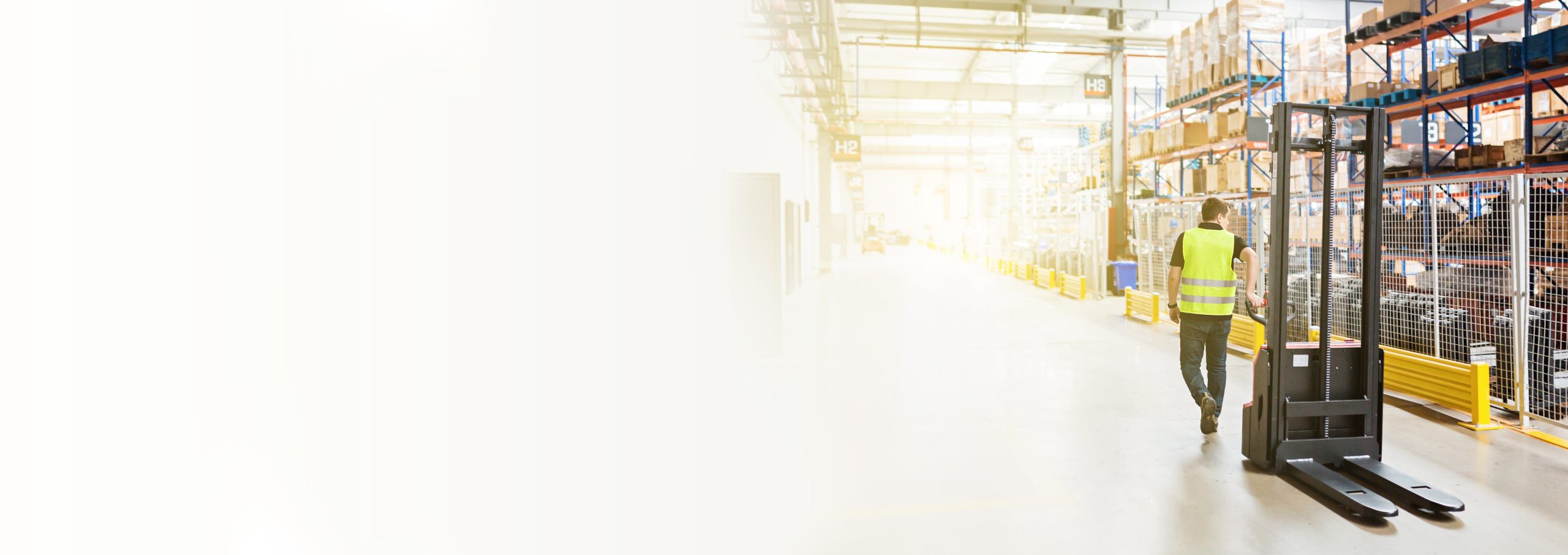 caucasian-employee-working-on-modern-warehouse-in-2023-11-27-05-35-21-utc